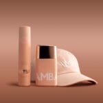 A hat, a tanning oil, a sprayer.